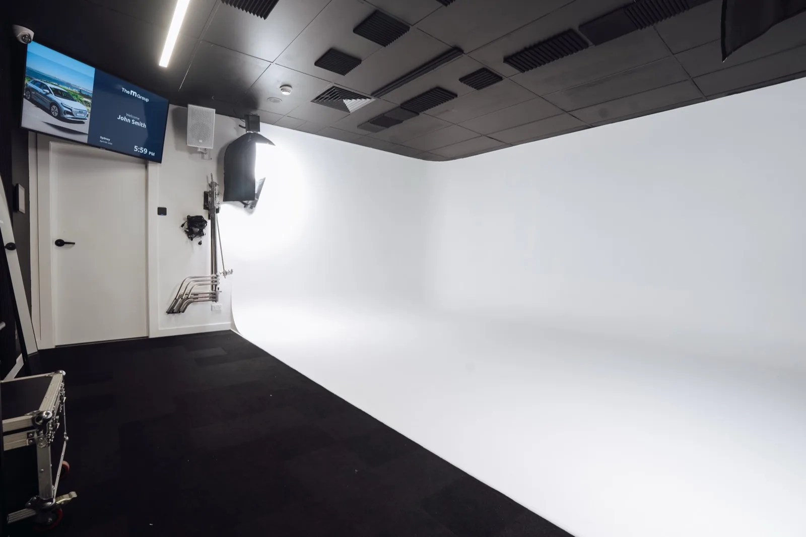 Clean white cyclorama backdrop at The M1 Studio